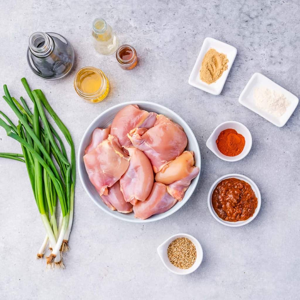 ingredients to make korean chicken laid out on a counter 
