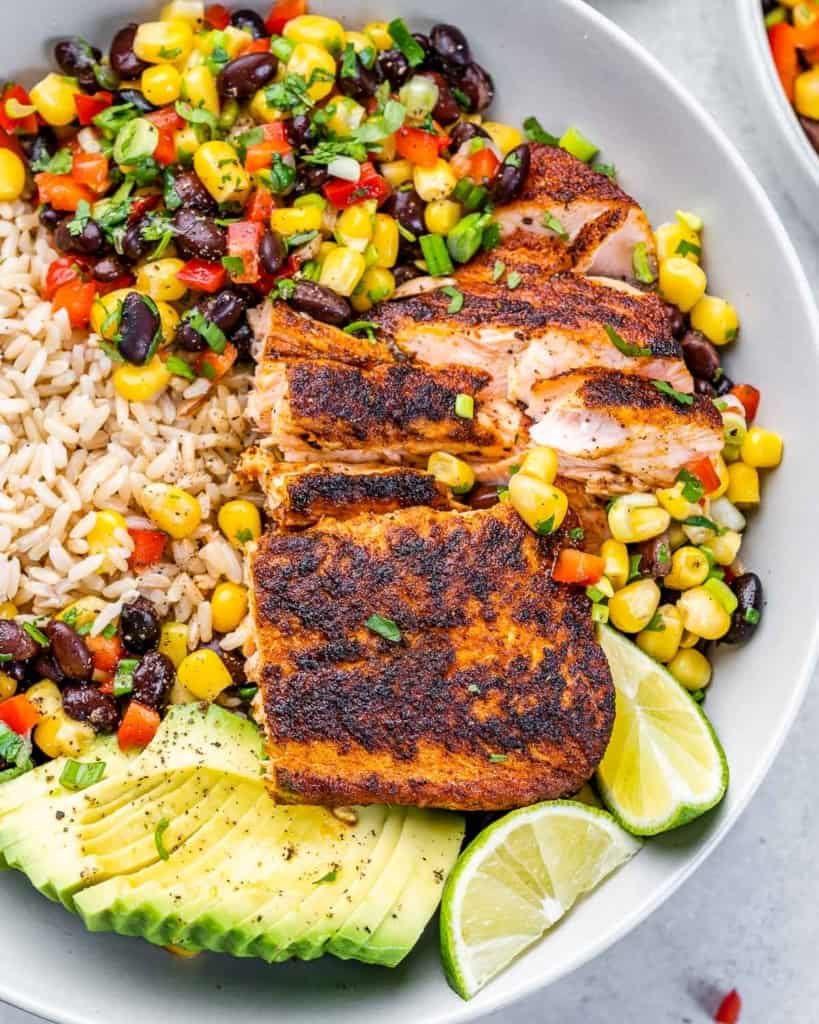 top view seared salmon with bean and corn salsa with rice 