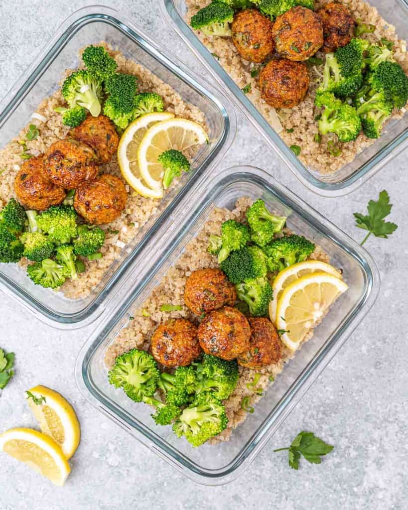 top view meal prep bowls with meatball quinoa and broccoli
