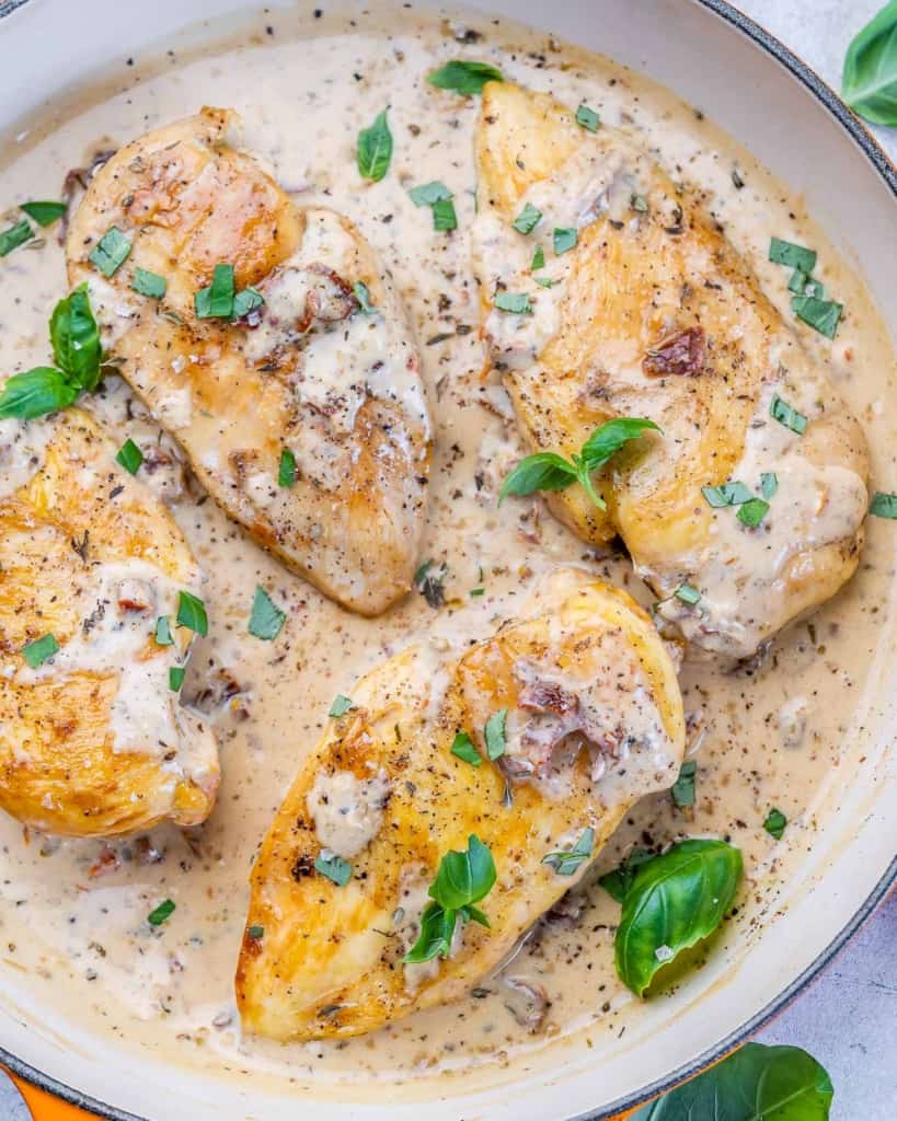 top view os chicken breast in a creamy sauce