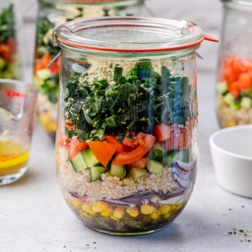 side shot of kale salad in a jar