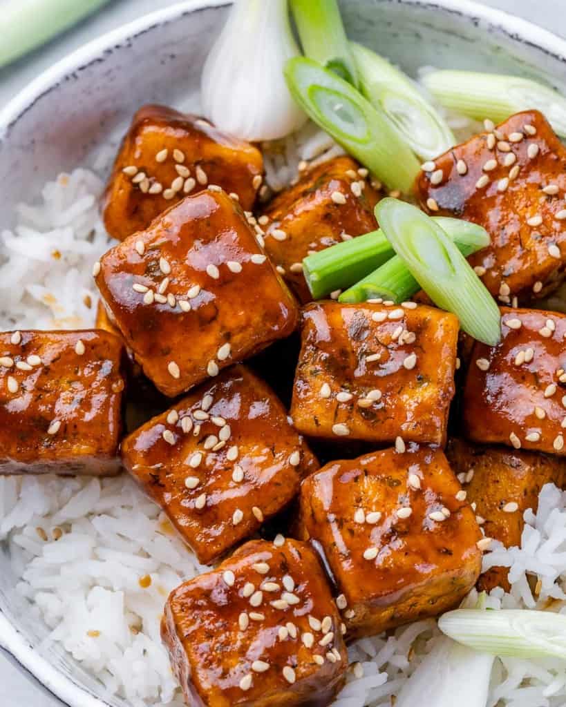 Air fryer tofu served with rice in a small bowl.