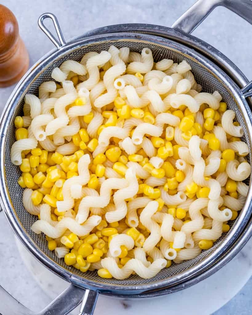 Pasta mixed with corn.
