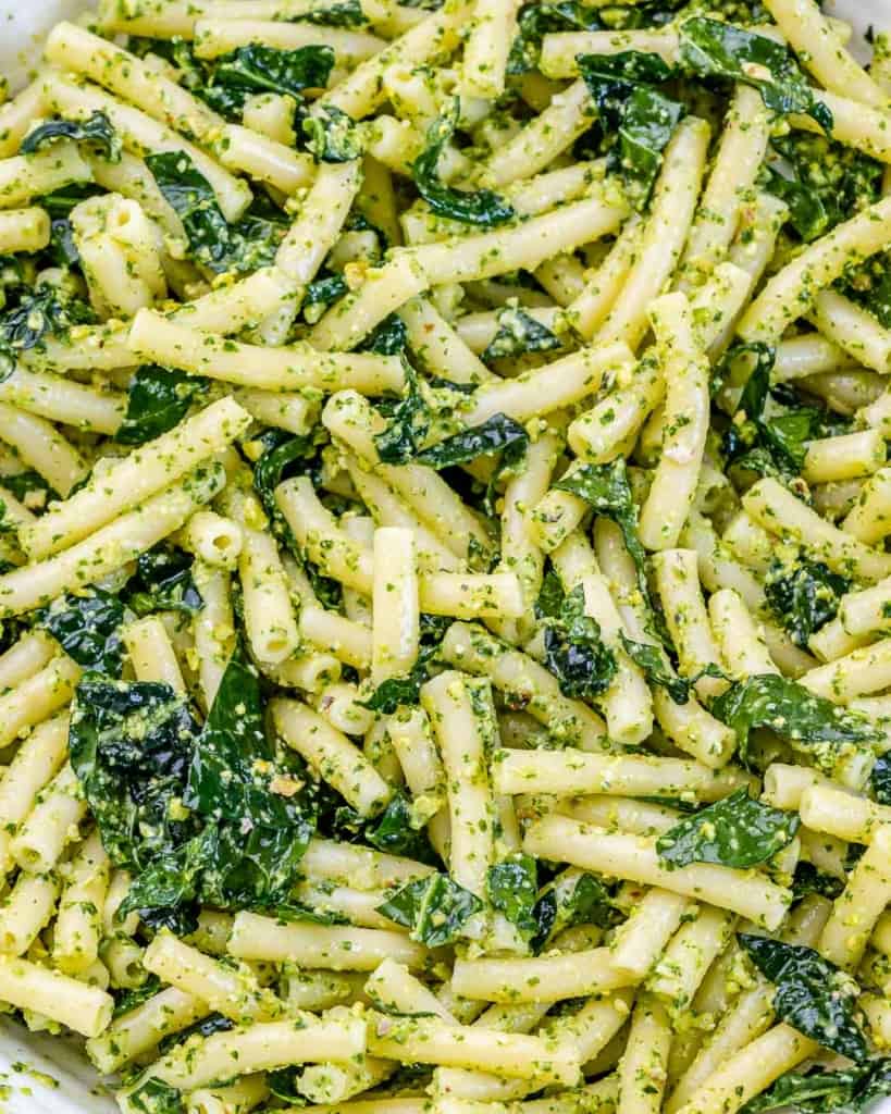 Pasta tossed with a pesto sauce and kale.