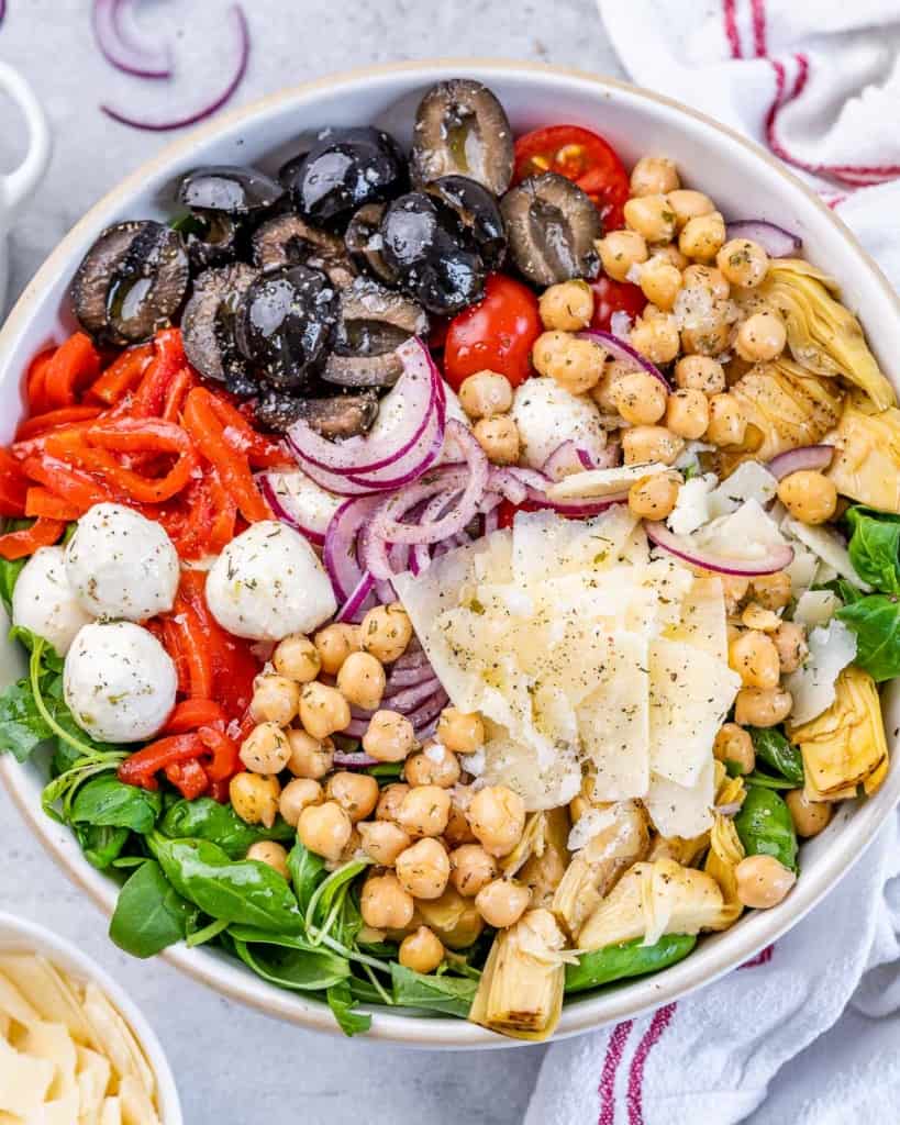 top view salad with chickpeas and other veggies in a white round bowl