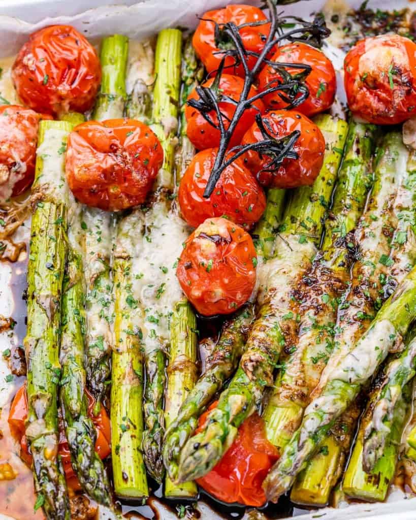 Cheesy roasted asparagus and cherry tomatoes.