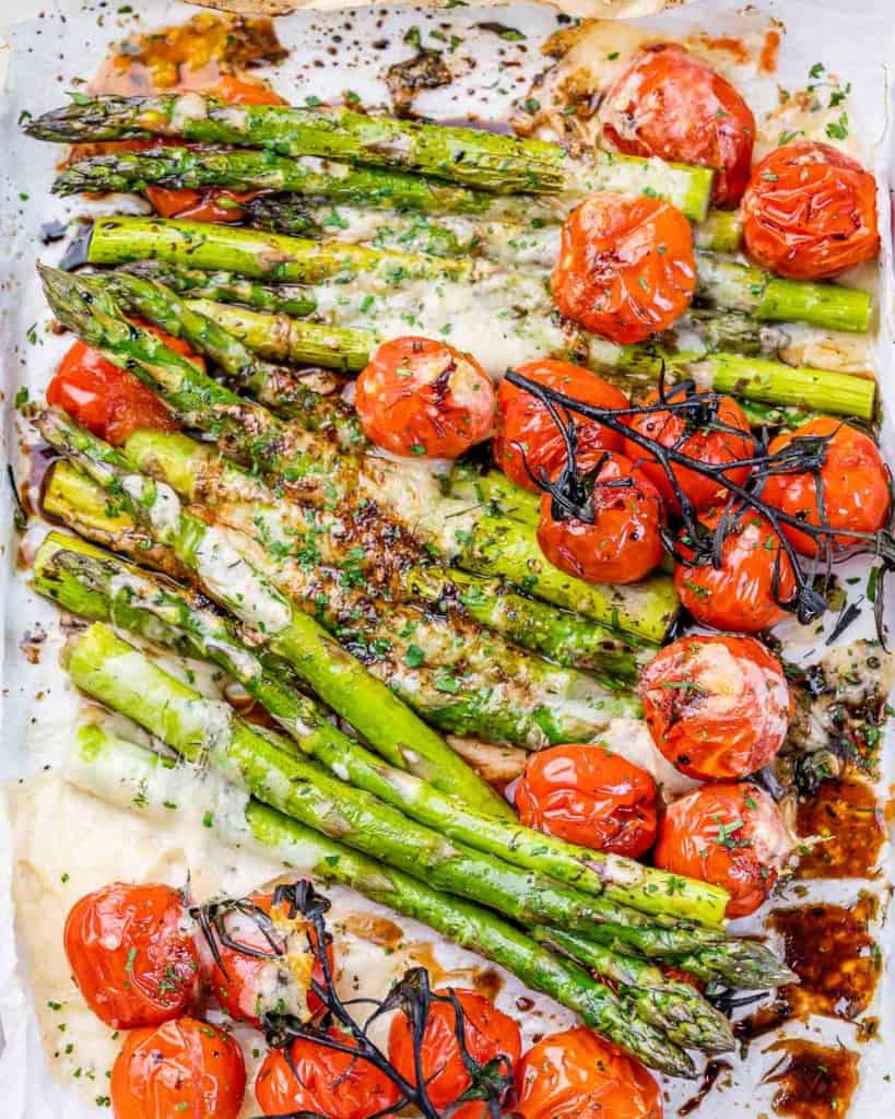Baked asparagus with cherry tomatoes.