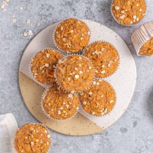 top view carrot cake muffins on a round platter