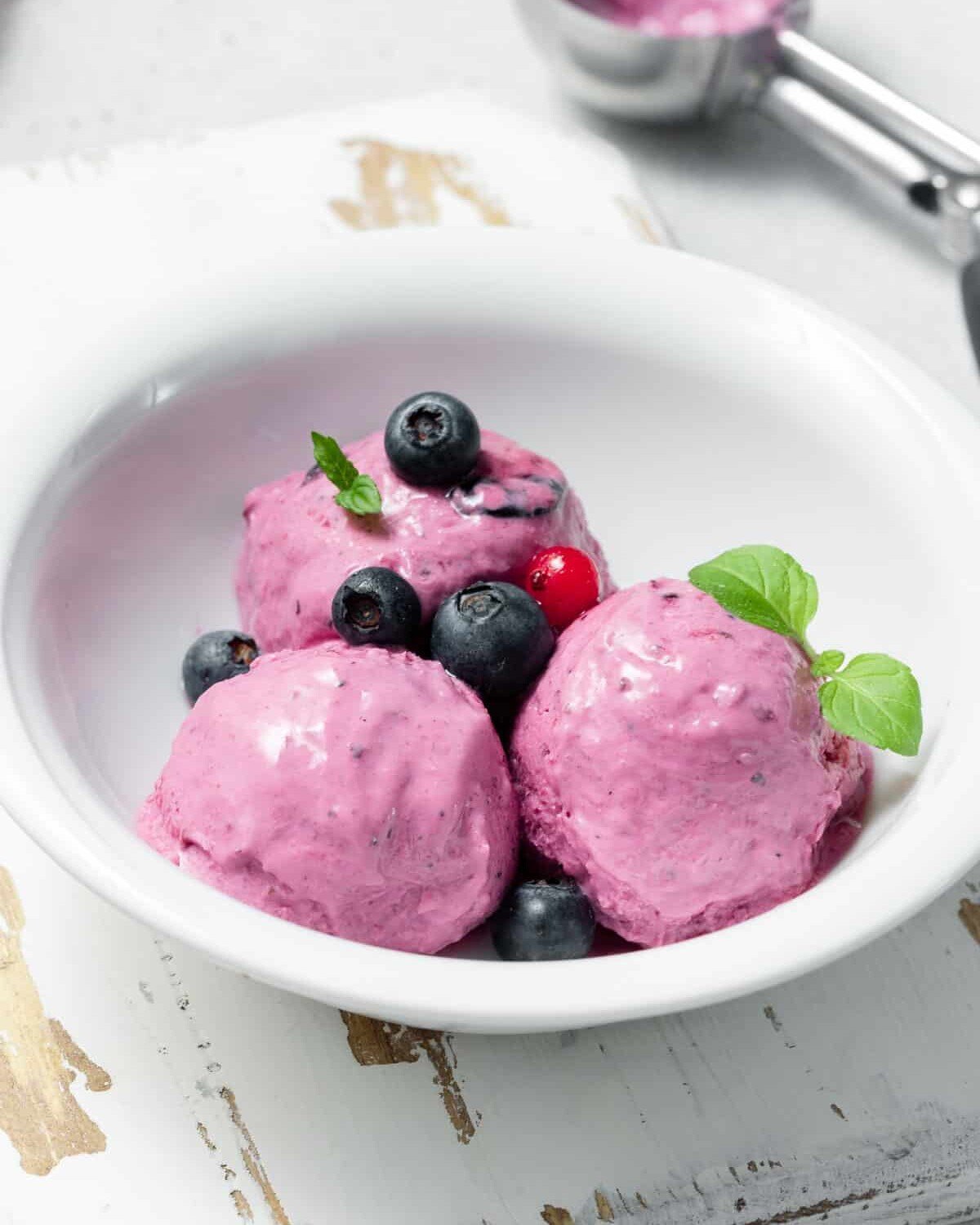 cottage cheese icecream balls in a white bowl