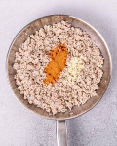 seasonings over cooked ground chicken