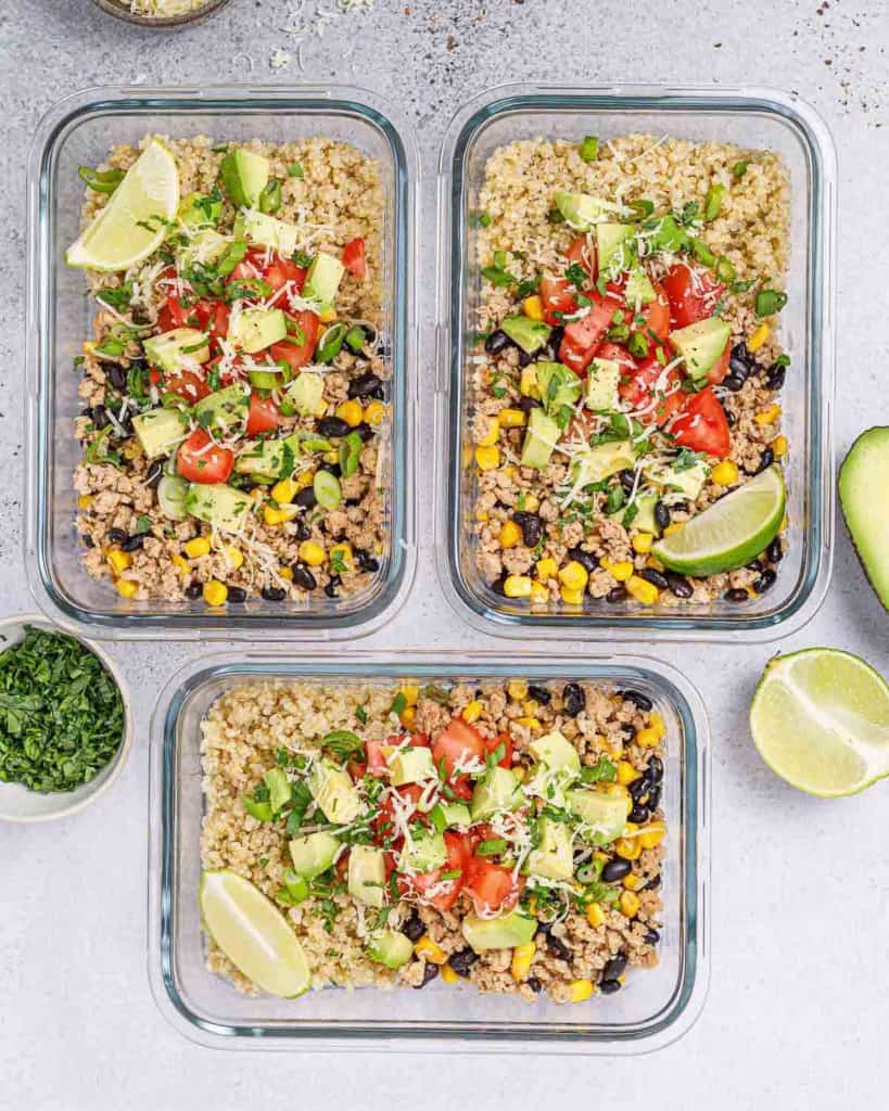 3 meal prep bowls of chicken taco with a side of quinoa and corn salsa