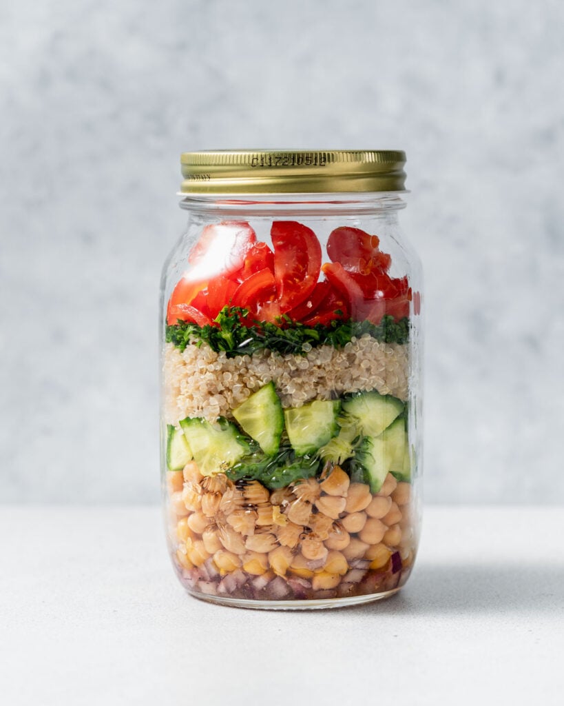 Chickpea quinoa jar salad with the lid.