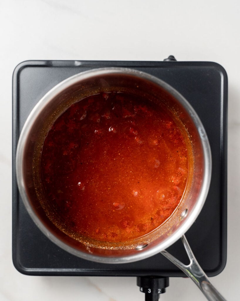 bbq sauce simmering in a pot