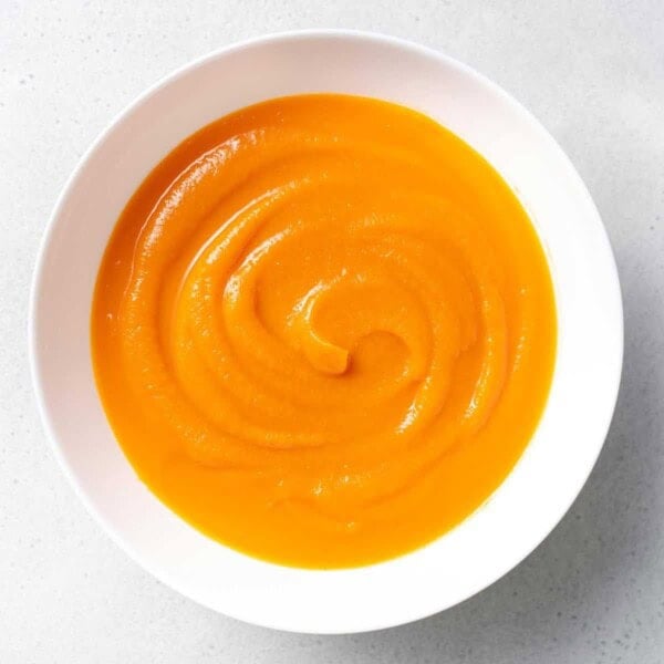 top view of pureed pumpkin in a round white plate
