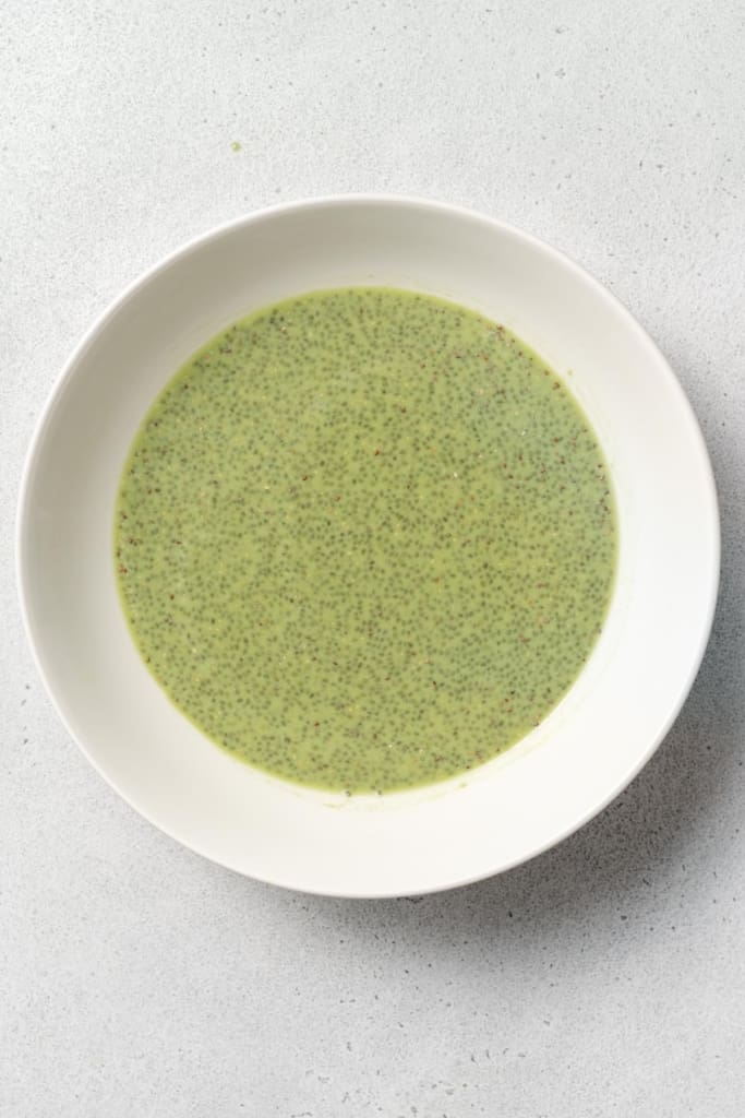 chia seed combined with the matcha milk on a bowl