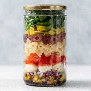 Italian pasta salad in a glass jar.