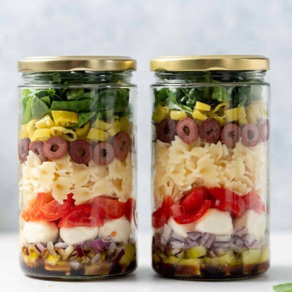 Two salad jars side by side.