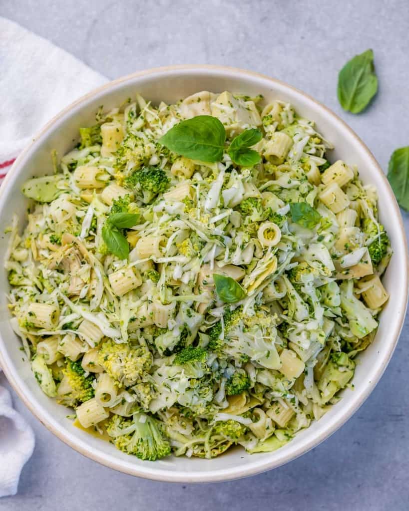 top view green pasta salad with broccoli, artichoke and cabbage 