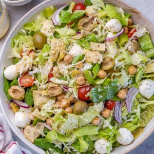 top view salad with mozzarella pearls on a round bowl