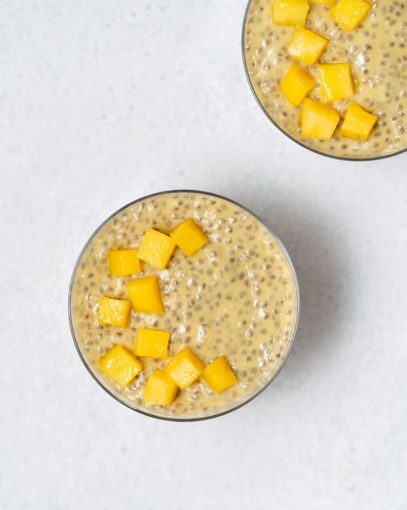 mango chunks added over a cup of chia pudding