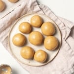 top view of peanut butter balls on a round white plate