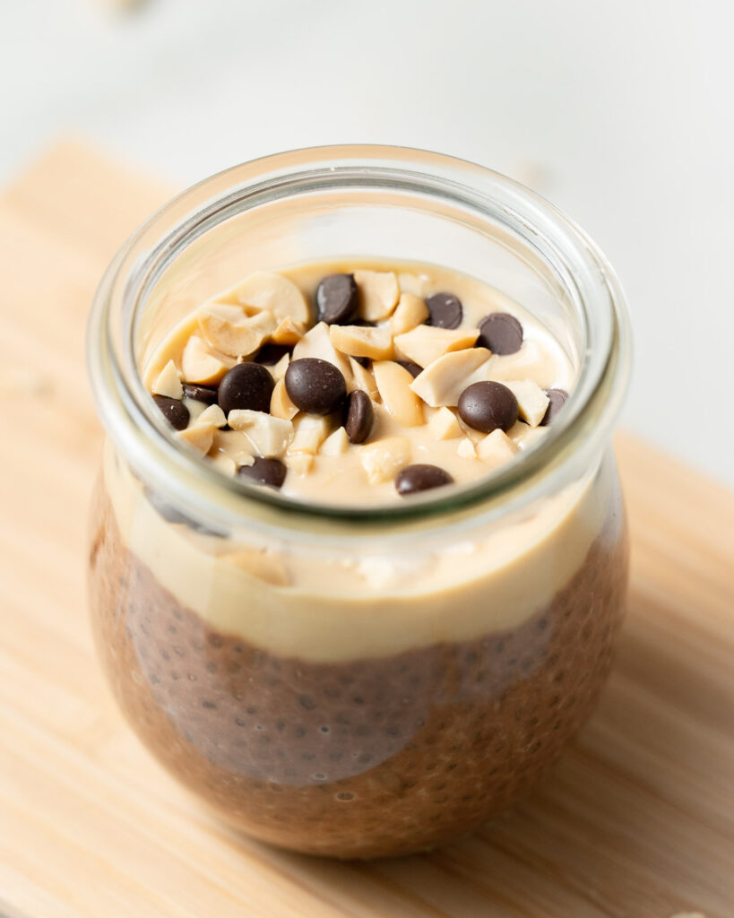 top view of a jar with chia pudding topped with chocolate chips