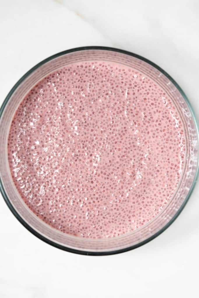 chia seed blended and soaked in raspberry milk in a round bowl