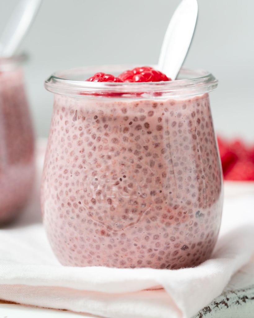 side shot of raspberry chia pudding in a jar