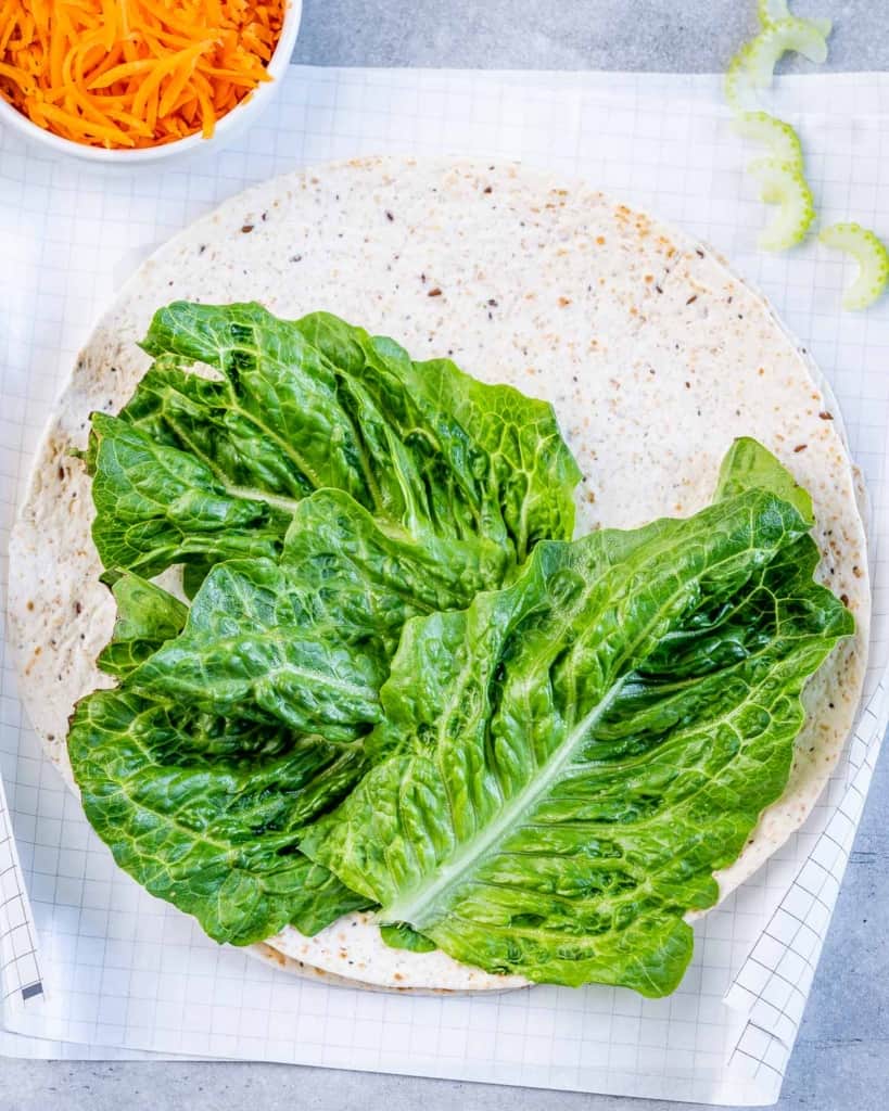 lettuce laid on a tortilla wrap