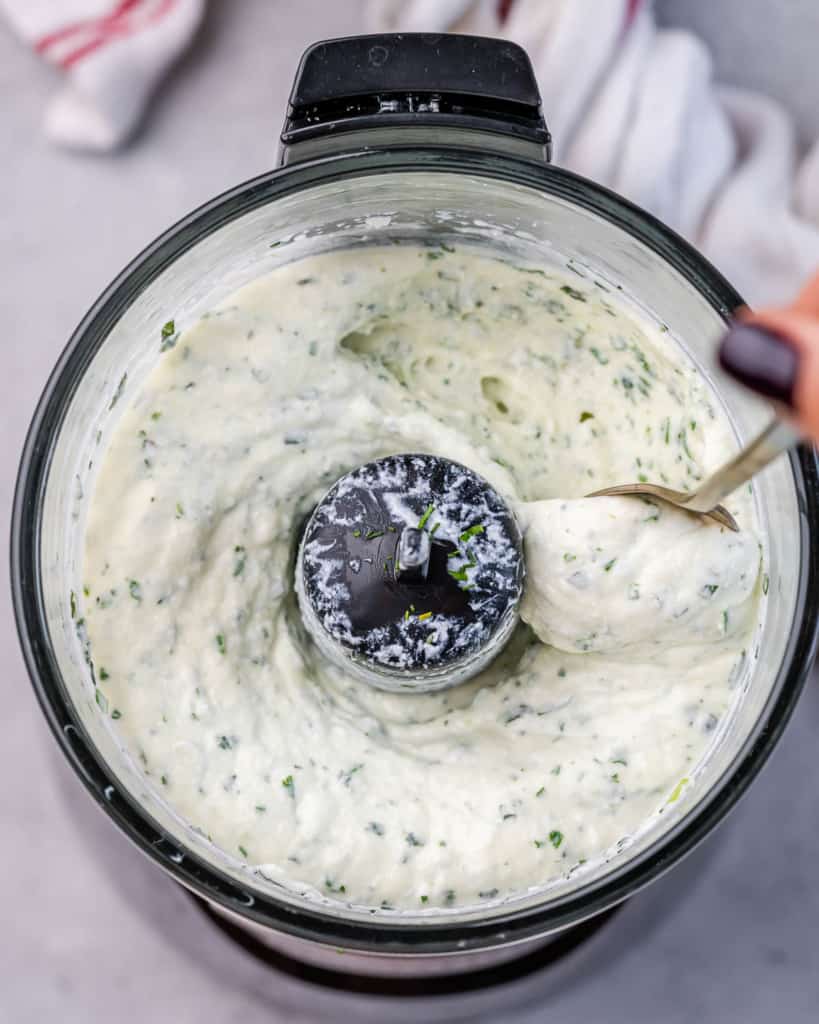 Cottage cheese blended with fresh herbs in a food processor.