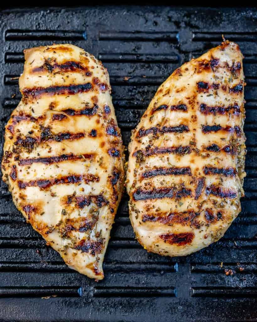Grilling chicken breasts.