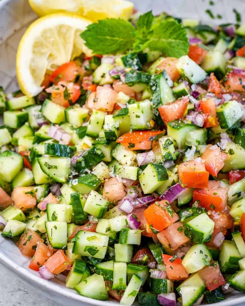 close up side shot of shirazi salad in a bowl