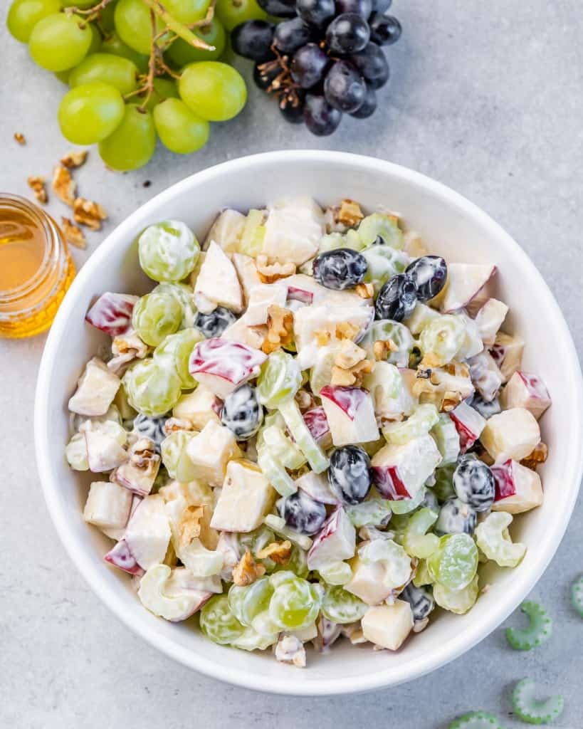 Salad made with grapes, apples and walnuts in a creamy dressing.