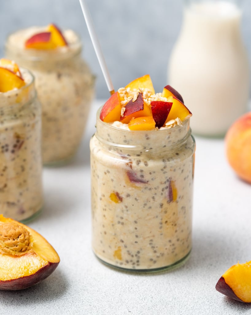 Overnight oats in a jar, topped with chopped peaches.