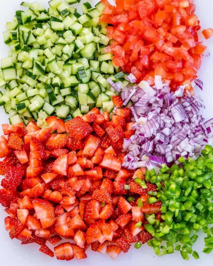 Chopped strawberries, cucumbers, red onion and tomatoes.