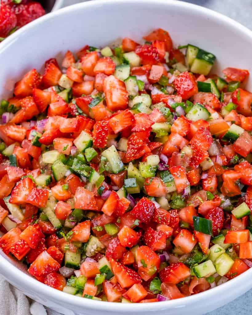 Strawberry salsa served in a white bowl.