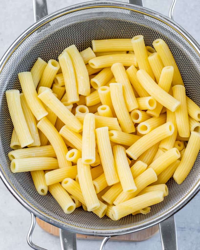 Draining pasta in a colander. 