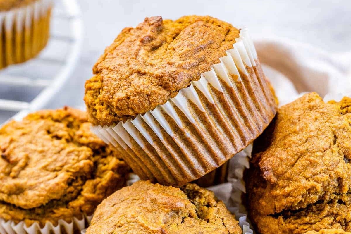 Pumpkin muffins in paper liners.