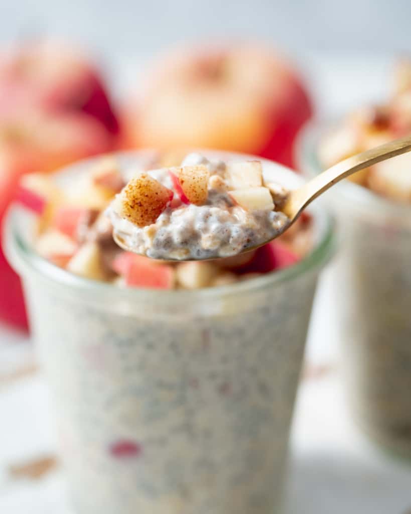 Spoonful of apple overnight oats.