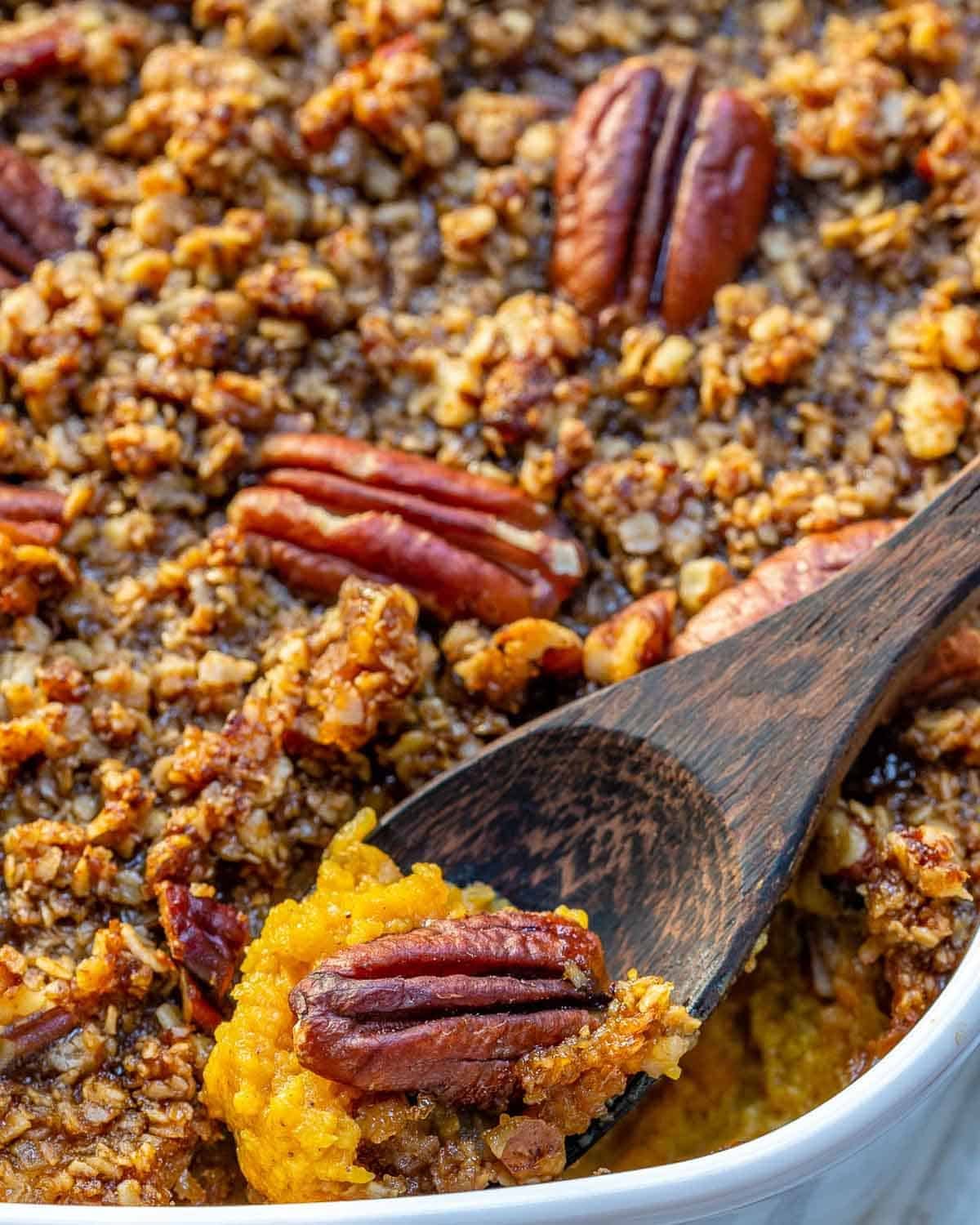 a spoonful of butternut squash in a dish.