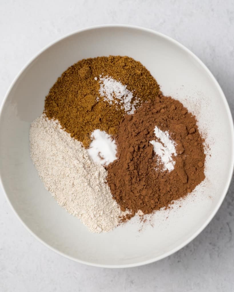 Flour, cocoa powder and spices in a large bowl.