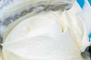Whipping cream cheese in a food processor.