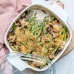 a square dish with healthy green bean casserole.