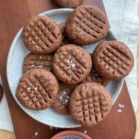 Almond flour chocolate cookies on a plate.