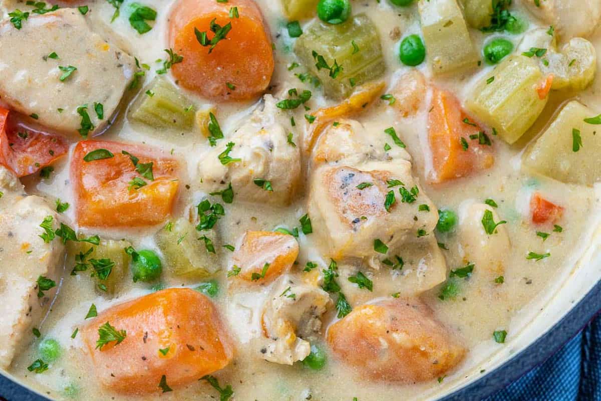 Creamy chicken stew in a stock pot.