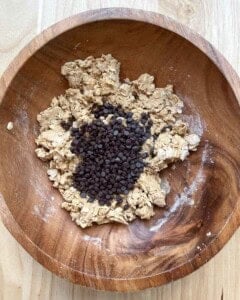 Mini chocolate chips are added to the peanut butter oats dough.