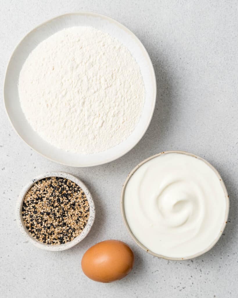 ingredients to make homemade bagels laid out on a flat surface