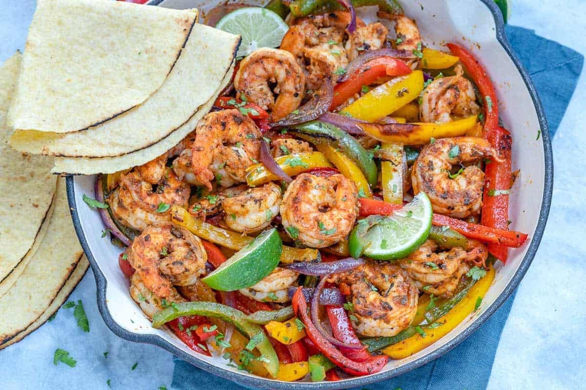 shrimp fajitas in a skillet.