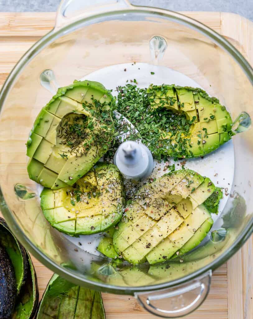 yogurt, avocados, and spices added to a food processor