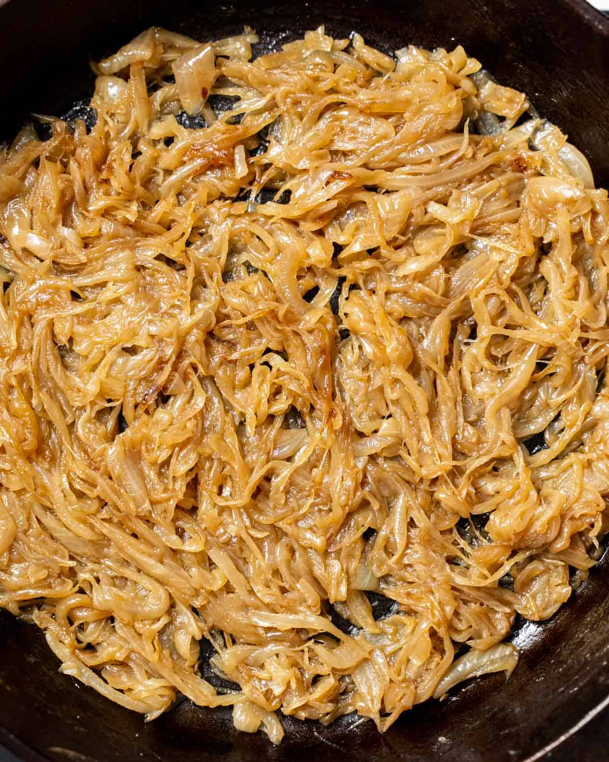 top view of a skillet with caramelized onions